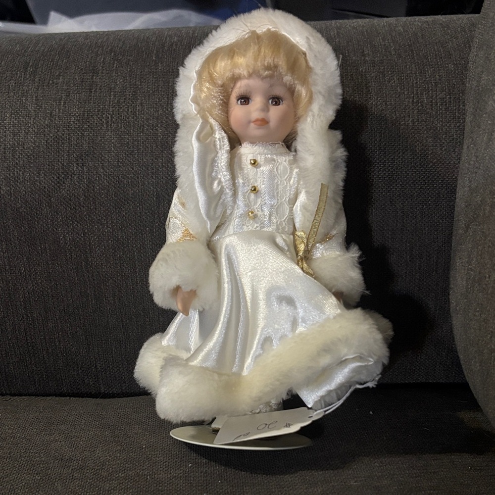 Elegant White and Gold Porcelain Doll